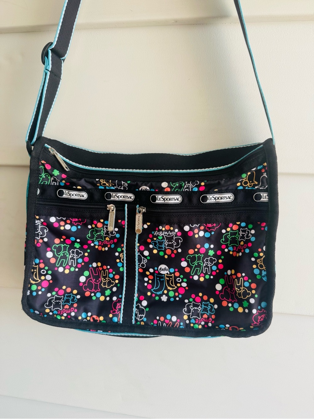 Lesportsac Black Crossbody Bag with bright animal print